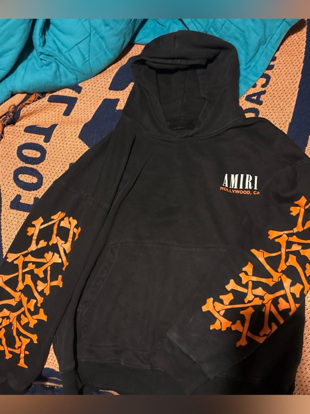 Amiri Black Hoodie with Orange boneless Sleeves